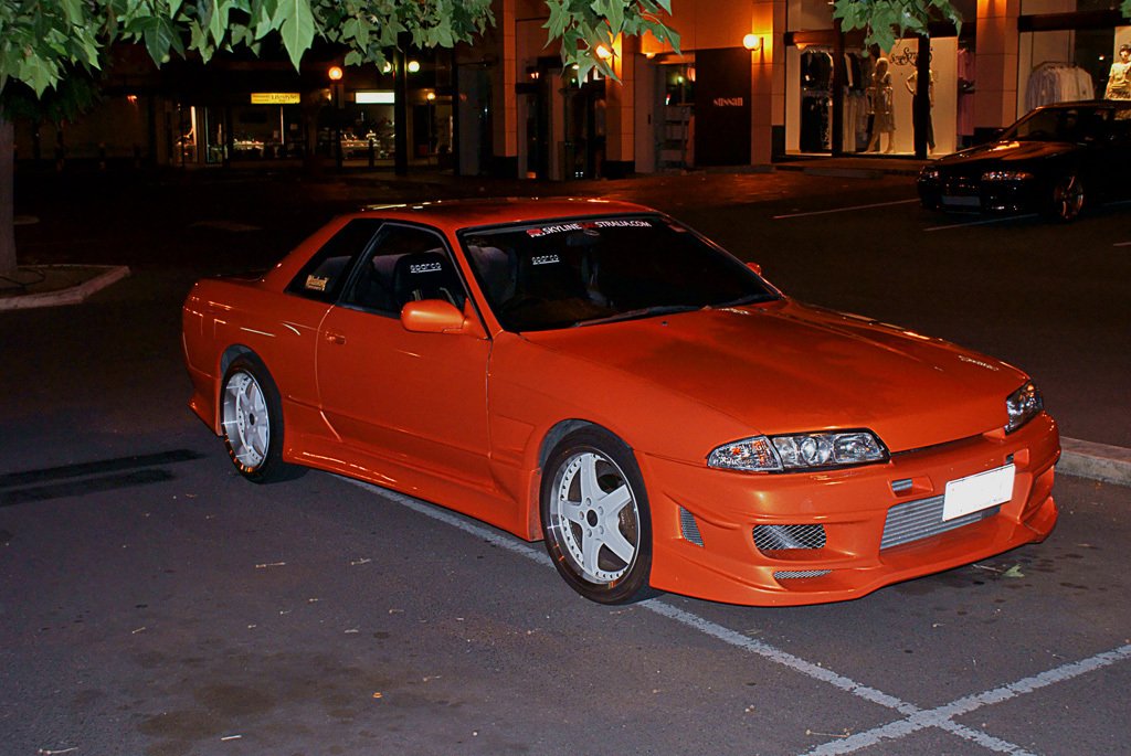orange r32 in dark lot.jpg