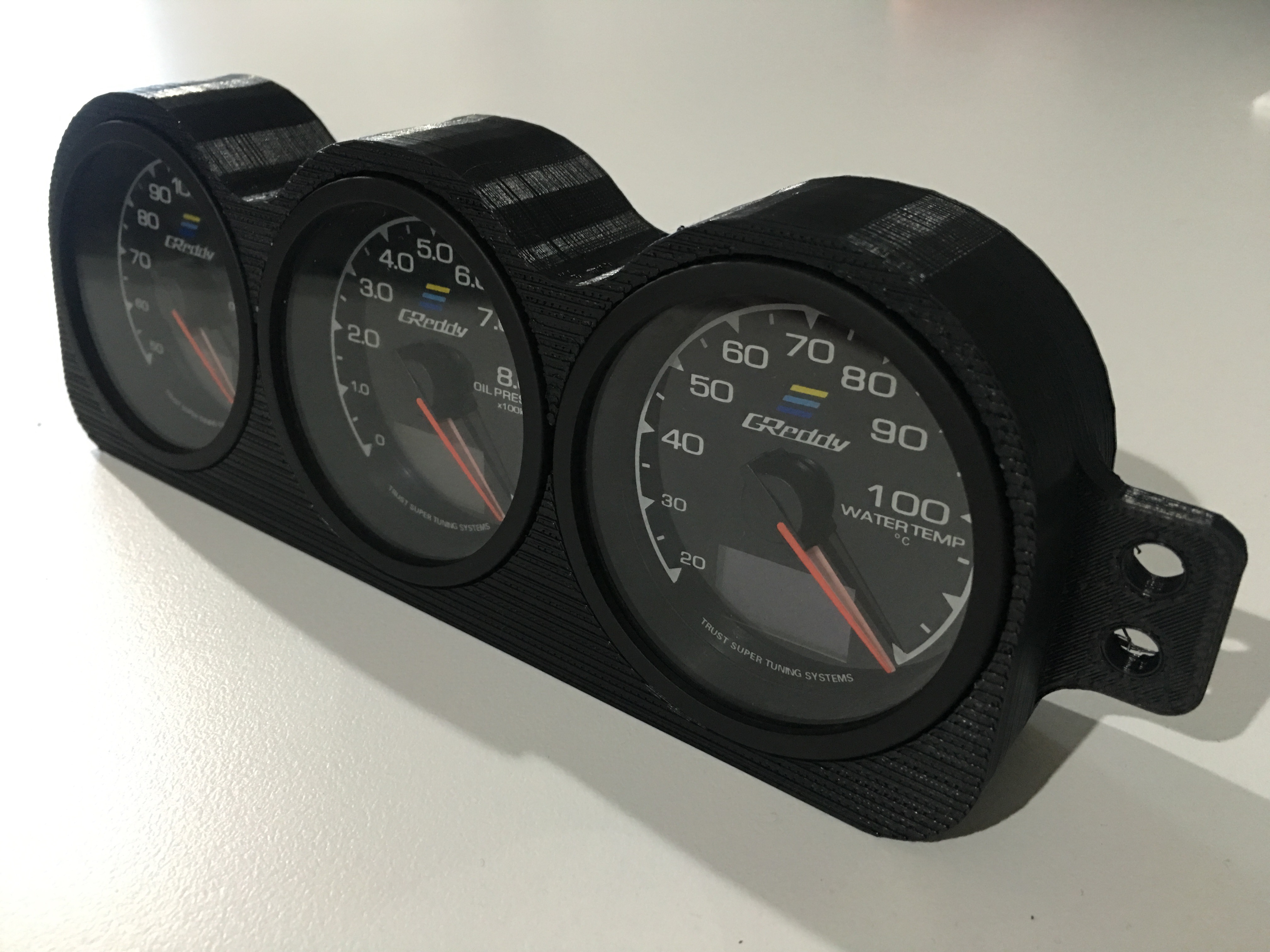 a 3D printed gauge mount that fits behind the factory triple gauge. can be ...