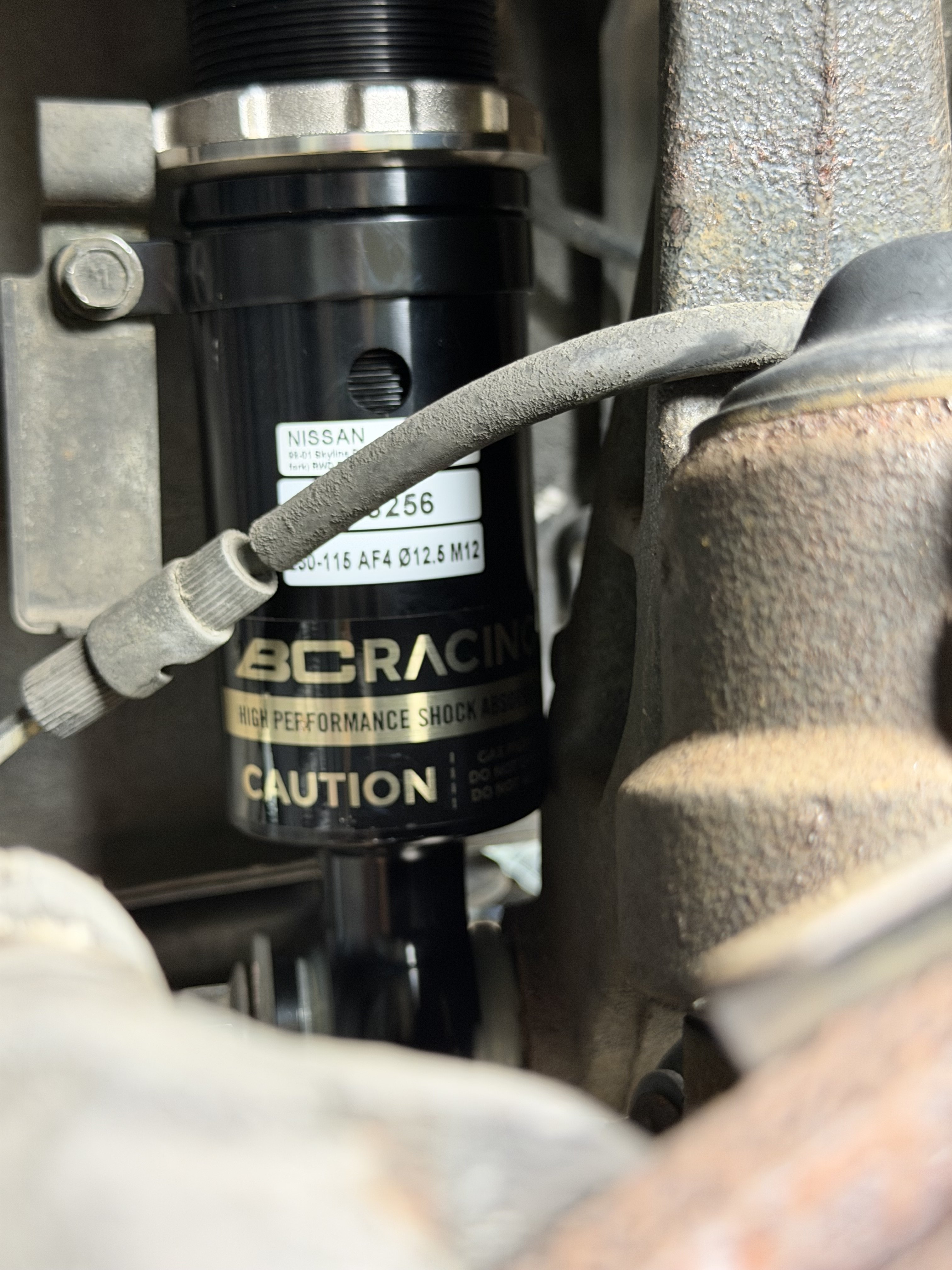 New front coil overs rubbing (?)