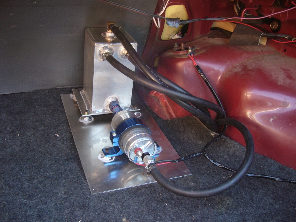 fuel surge tank plumbing