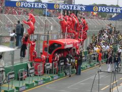 Ferrari crew before Schey takes 1st