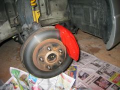 spraying the callipers red-front