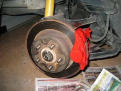 spraying the callipers red-rear